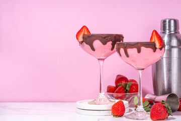 Sweet chocolate strawberry cocktail, cute pink strawberry martini or daiquiri creamy drink, with...