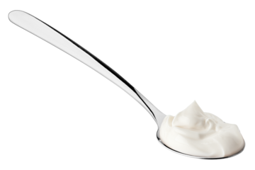 sour cream in spoon, mayonnaise, yogurt, isolated on white background, full depth of field