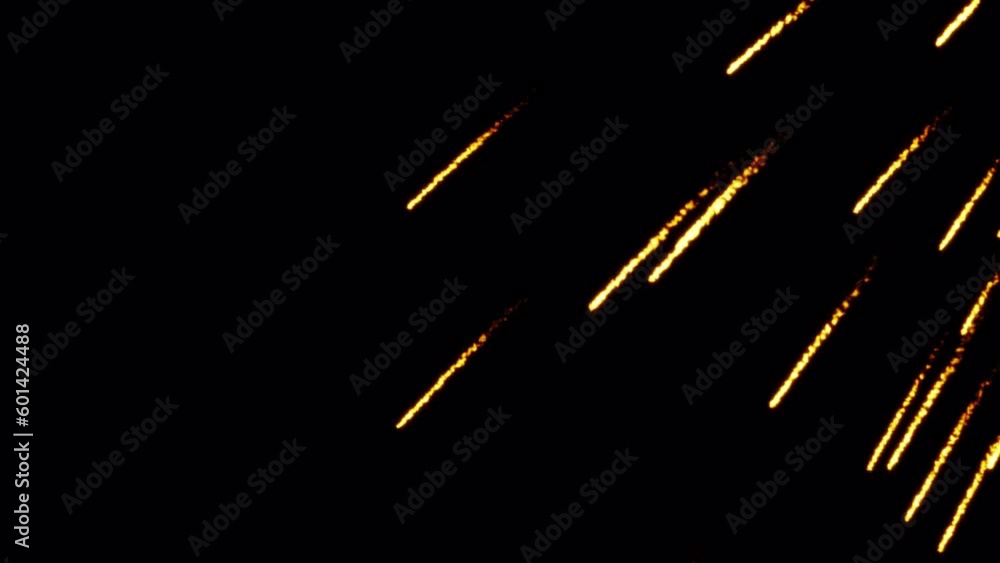 Poster loop glow gold fire meteoroid particles falling down on black background for screen project overlay.