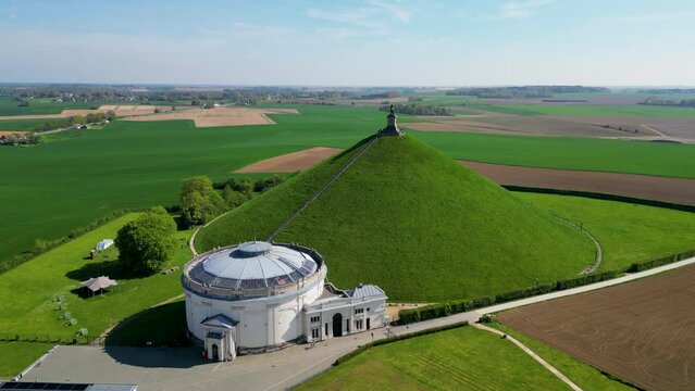 Aerial View at the Waterloo Hill with the statue of the lion of Memorial Battle of Waterloo, Belgium. Aerial landscape view shot by a drone. High quality 4k footage