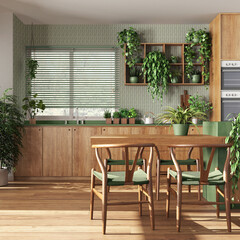 Modern wooden kitchen in white and green tones with island, chairs, window and appliances. Biophilic concept, many houseplants. Urban jungle interior design