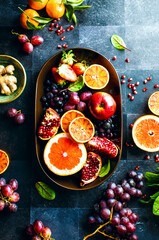 Fruits and berrires in a dish, top down view