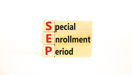 SEP symbol. Concept words SEP Special enrollment period on beautiful wooden block. Beautiful white table white background. Medical and SEP Special enrollment period concept. Copy space.