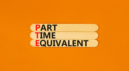 PTE Part time equivalent symbol. Concept words PTE Part time equivalent on wooden sticks. Beautiful orange table orange background. Business and PTE Part time equivalent concept. Copy space.