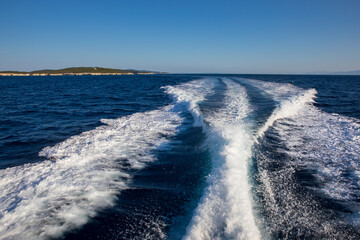Traveling by sea on a yacht from the ANTIPAXOS island, Corfu Regional unit, Ionian Islands, Greece in summer.