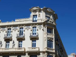 corner of vintage rich building in baroque architectural style downtown madrid, spain