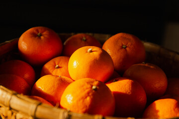 Tasty and Delicious orange fruit fresh and healthy in basket.