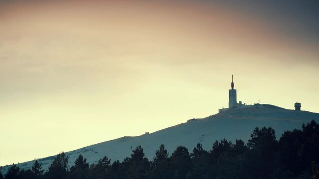 Time lapse. Clouds moving in the evening over summit of Mont Ventoux, mountain in Provence region, southern France.