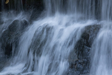 Fototapeta na wymiar Natural Waterfall over rocks