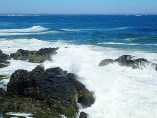 Ocean waves meeting the shore