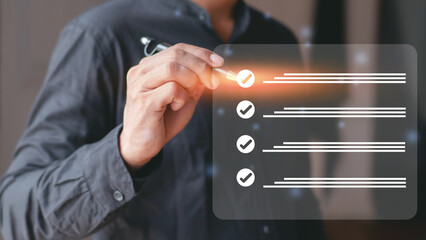 Business performance checklist, businessman using virtual screen doing online checklist survey, filling digital form checklist