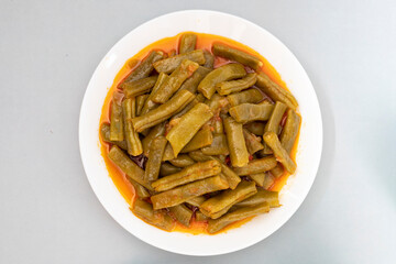 Traditional delicious Turkish food; Green beans with olive oil; Turkish name; Zeytinyagli taze fasulye