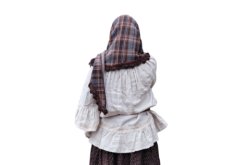 A woman in a scarf and old clothes at the entrance to the old European Church, isolated on a white background. Retro style on Halloween, 18-19th century