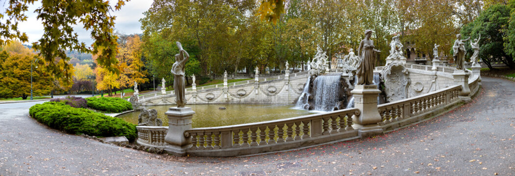 Turin, Italy - Nov 09, 2021: Panoramic view of the Baroque Fountain of the 12 Months in Parco del Valentino on the banks of the Po River - a favorite recreation spot for locals and tourists.