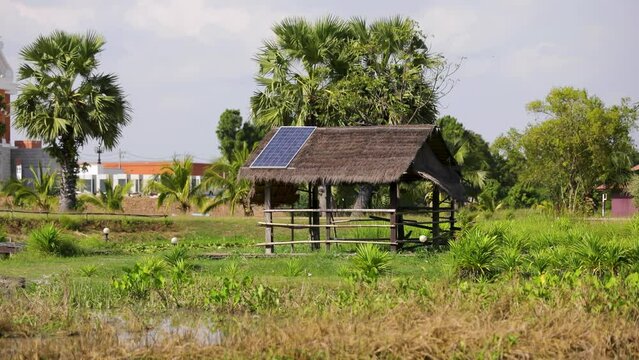 Wooden hut with solar panel on the roof