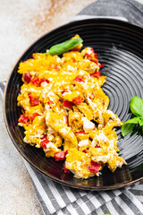 scramble eggs pepper paprika healthy meal food snack on the table copy space food background rustic top view