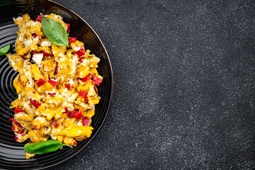 scramble eggs pepper paprika healthy meal food snack on the table copy space food background rustic top view