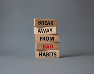 Break away from bad habits symbol. Wooden blocks with words Break away from bad habits. Beautiful grey background. Business and Break away from bad habits concept. Copy space.