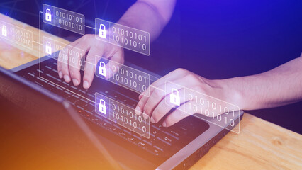 Businessman using a laptop computer to Blockchain technology concept with chain of encrypted blocks...