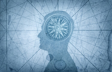 Human head and compass. The concept on the topic of navigation, psychology, morality, etc.