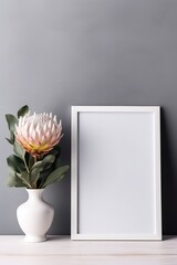 Empty white frame mockup with Scandinavian look, protea flowers in vase, AI Generated