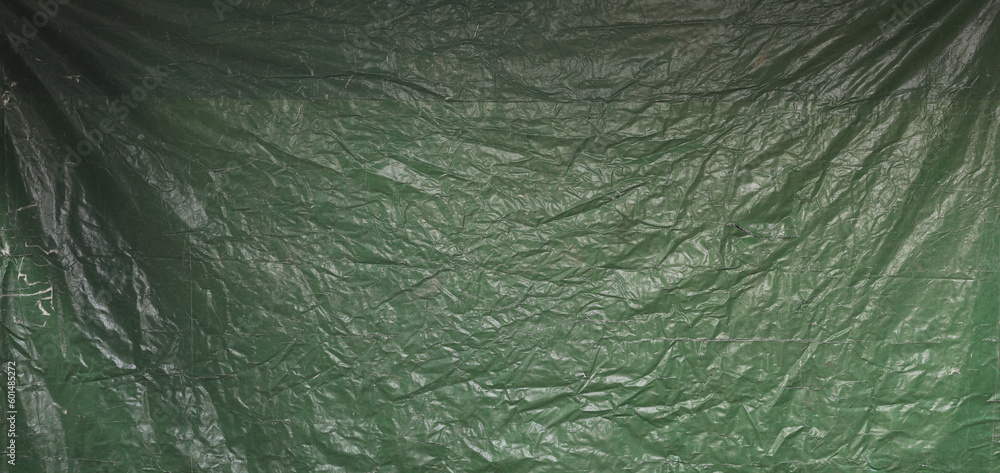 Poster green abstract crumpled old tarpaulin background