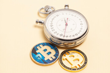 Stopwatch and bitcoins. Fast money on bitcoin. Fast cryptocurrency transfer