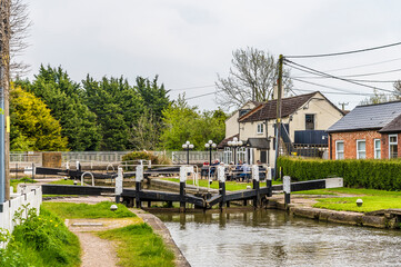 A view towards the lock gates at Long Buckby Wharf on the Grand Union canal in summertime