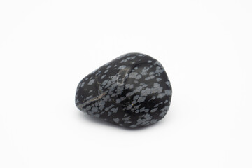 Snowflake Obsidian stone isolated on white background