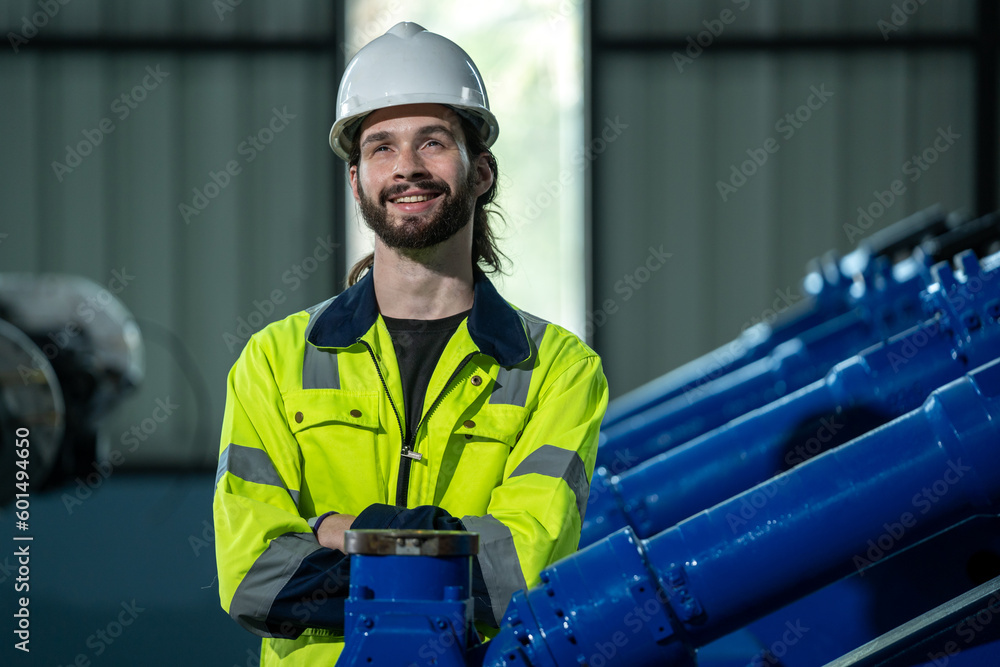 Aufkleber engineer checking weld header of welding arm robot machine with data specification at industrial fac