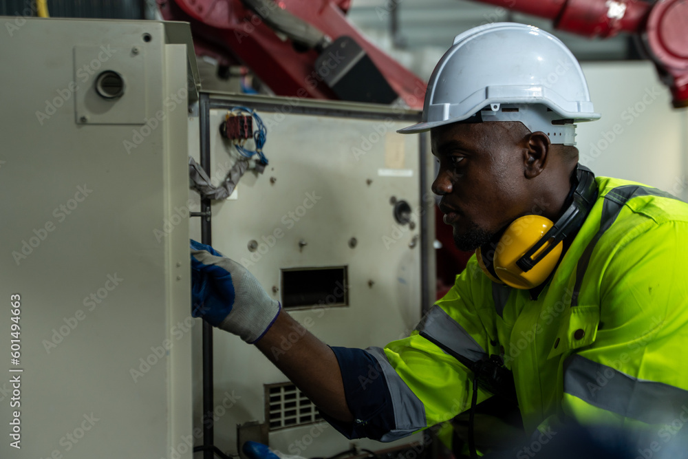 Poster engineer and project manager in modern industrial factory with robot arms discuss and planning optim