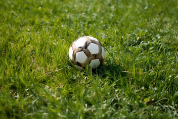 Generative AI.soccer ball on green grass outdoors - 601498083
