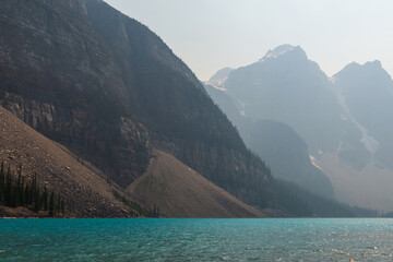 Moraine Lake in wildfires smoke and smog, Banff national park, Alberta, Canada.