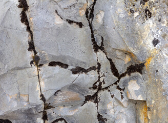the wall is made of natural material, the stone is a limestone material of volcanic origin,...