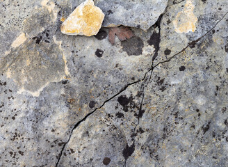 the wall is made of natural material, the stone is a limestone material of volcanic origin,...