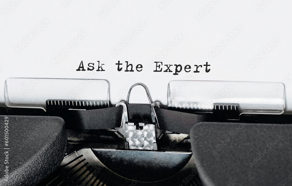 Aufkleber text ask the expert typed on retro typewriter