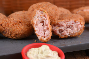 Fried and breaded codfish cake, fish empanadas, codfish cake, Brazilian-style codfish cakes, meat disc