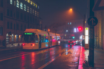 Fototapeta na wymiar berlin tram in fog, tram in foggy wet weather, blurry