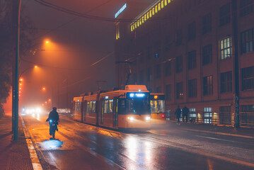 berlin tram in fog, tram in foggy wet weather, blurry
