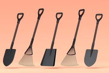 Garden shovel, pitchfork and rake on orange background, summer camping concept