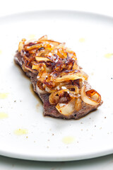 steak covered by caramelized onion