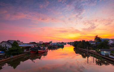 Many boats moored in sunrise morning time at Chalong port, Main port for travel ship to krabi and...