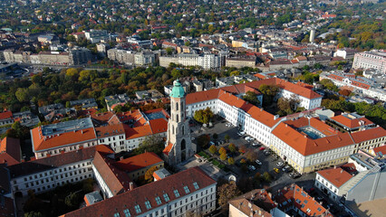 Fototapeta na wymiar Aerial view of Budapest city skyline. Church of Mary Magdalene of Buda, one of the oldest churches of the Varkerulet District, Buda Castle District