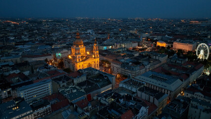 Obraz premium Aerial view of Budapest city and St. Stephen's Basilica at night, Hungary