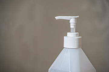 Fototapeta na wymiar White hand sanitizer pump top.