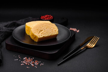 Delicious omelet with milk, spices and herbs cut into large pieces