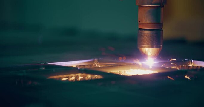 Plasma laser cutting metal sheet with sparks High Temperature