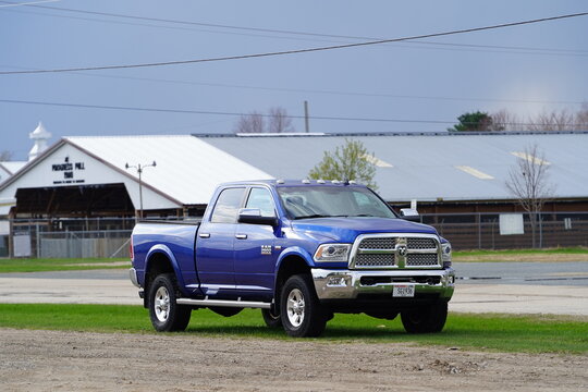 A Blue 2010 Dodge Ram 2500 pickup Truck sits at the roadside unused.