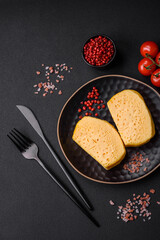 Delicious omelet with milk, spices and herbs cut into large pieces