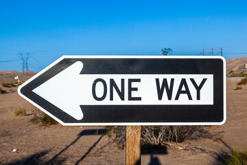 one way street Sign at the highway with blue sky